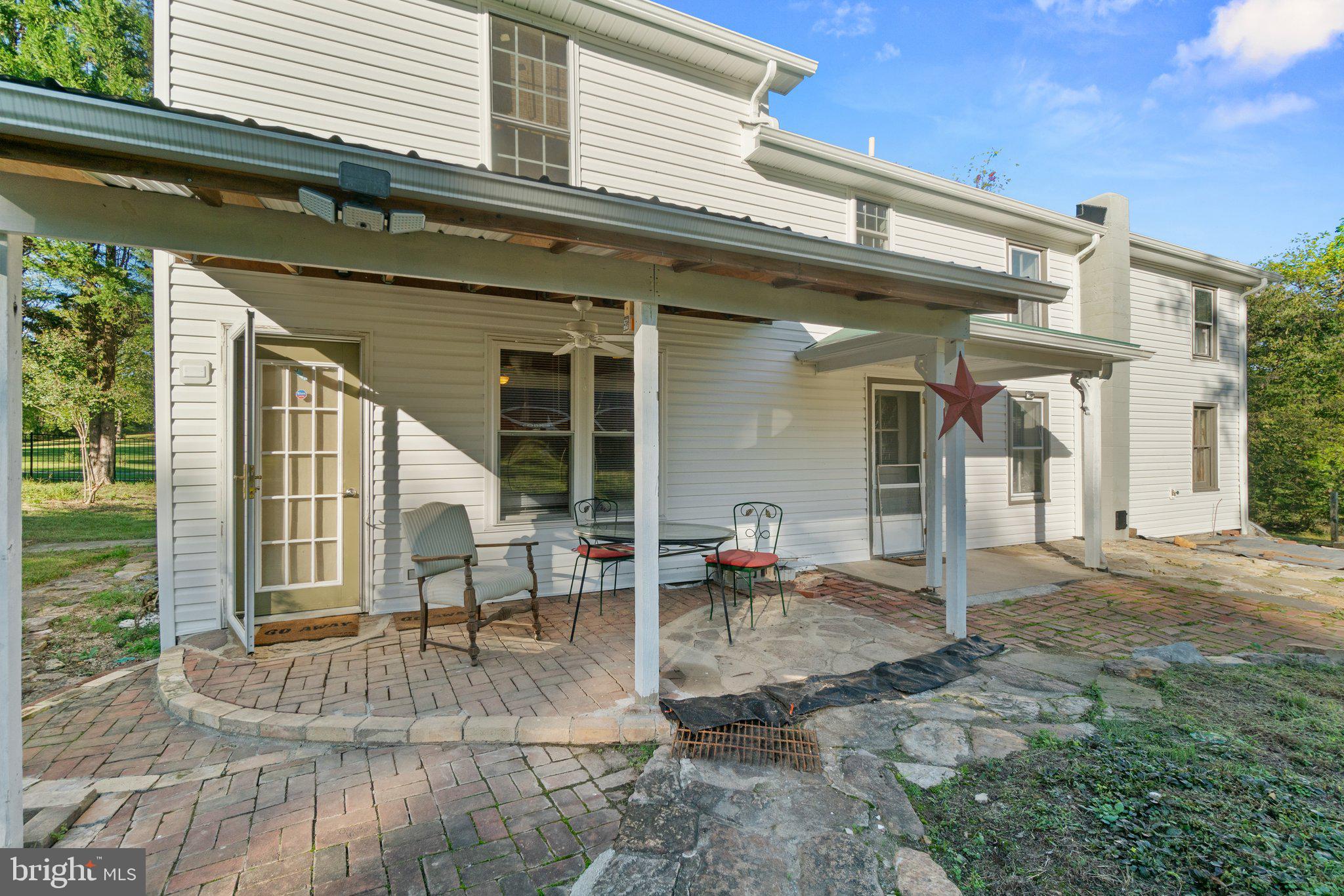 10819 Shanktown Road Big Pool, MD 21711 - Photo 28 of 79 a view of house with patio outdoor seating