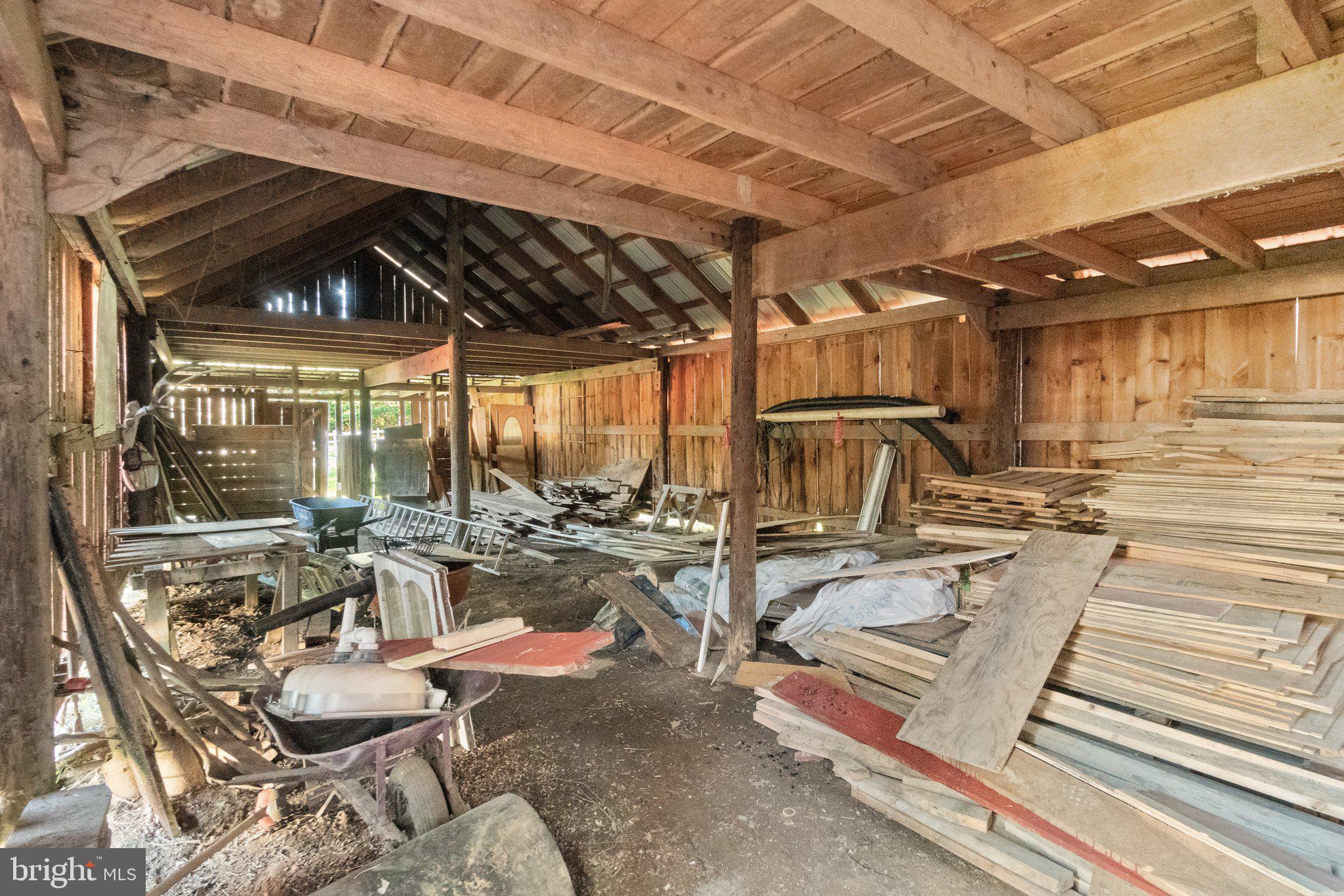 10819 Shanktown Road Big Pool, MD 21711 - Photo 30 of 79 a view of a patio with table and chairs and potted plants