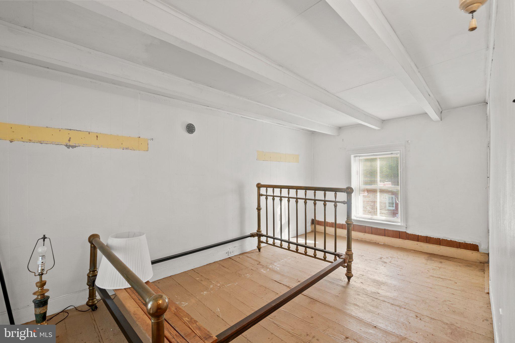 10819 Shanktown Road Big Pool, MD 21711 - Photo 47 of 79 a view of a hallway with wooden floor