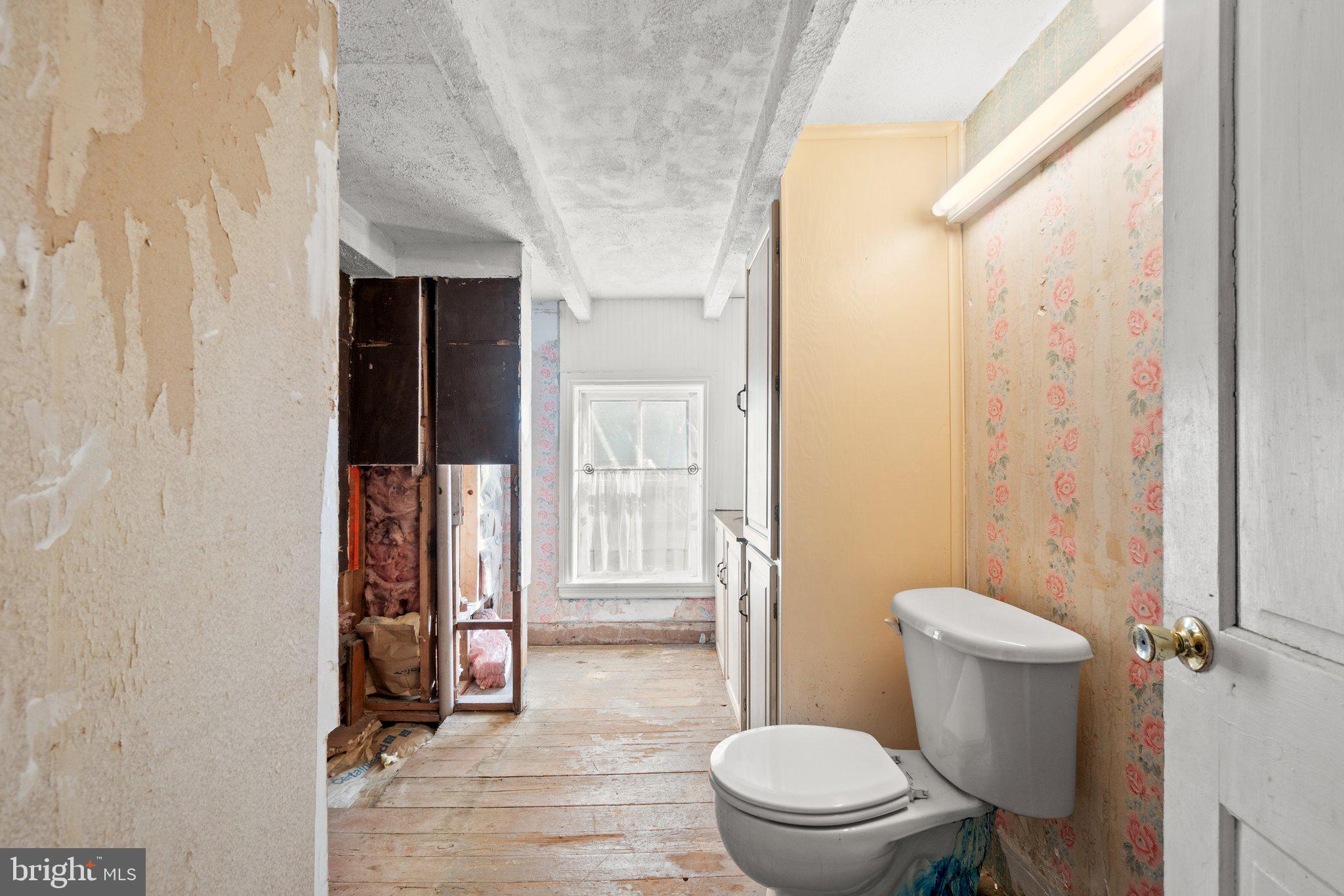 10819 Shanktown Road Big Pool, MD 21711 - Photo 50 of 79 a bathroom with a toilet and a shower