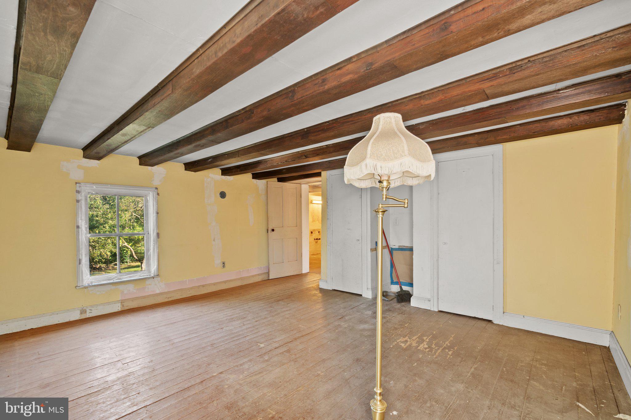 10819 Shanktown Road Big Pool, MD 21711 - Photo 53 of 79 a view of empty room with wooden floor and windows