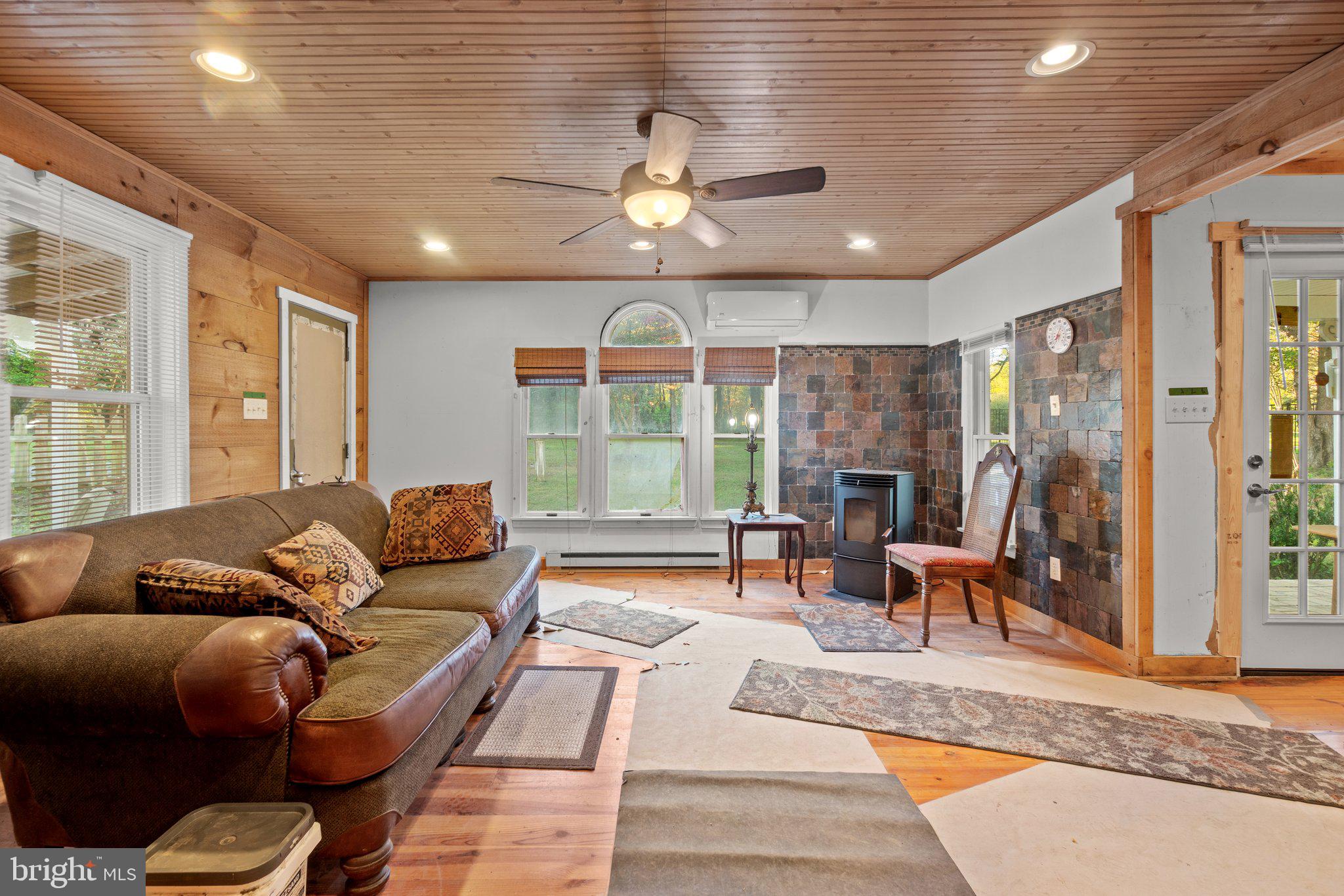10819 Shanktown Road Big Pool, MD 21711 - Photo 68 of 79 a living room with furniture and a large window