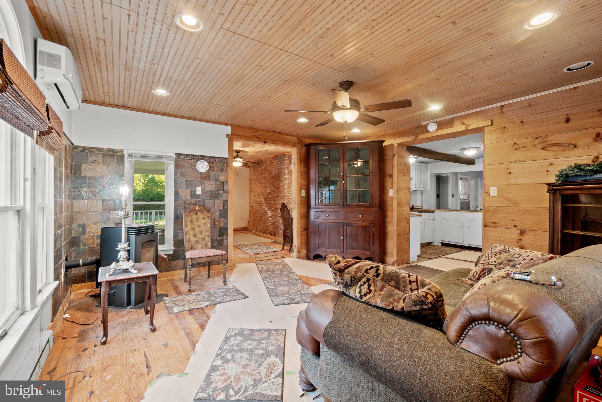 10819 Shanktown Road Big Pool, MD 21711 - Photo 71 of 79 a living room with furniture and wooden floor