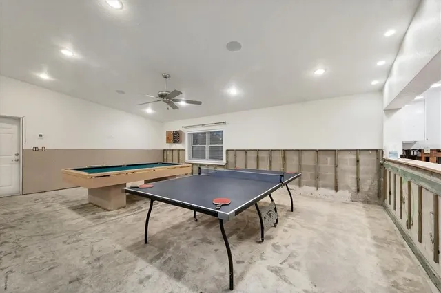 a living room with a couch and a table