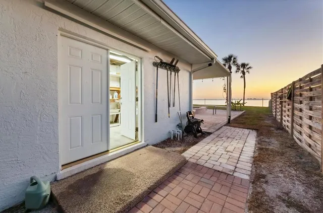 a view of a swimming pool with seating area