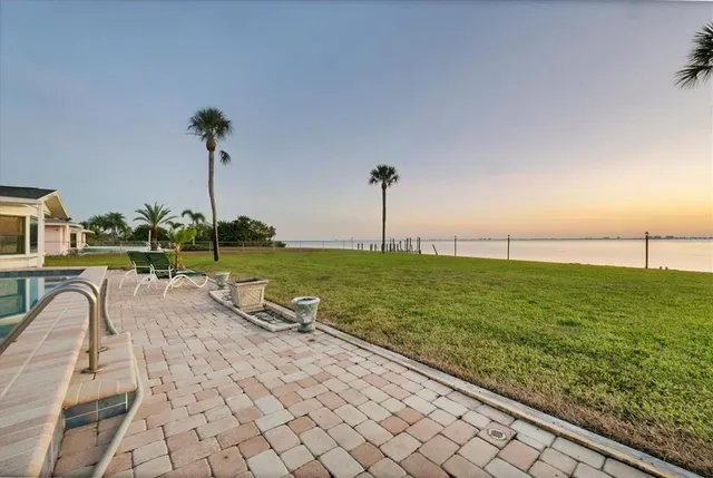a view of a lake with houses in ocean