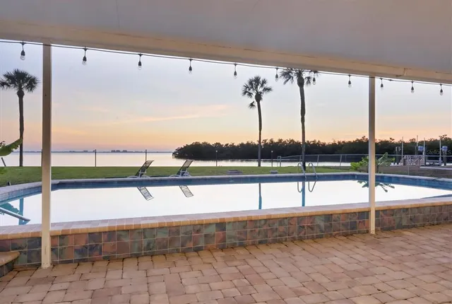 a view of a house with swimming pool