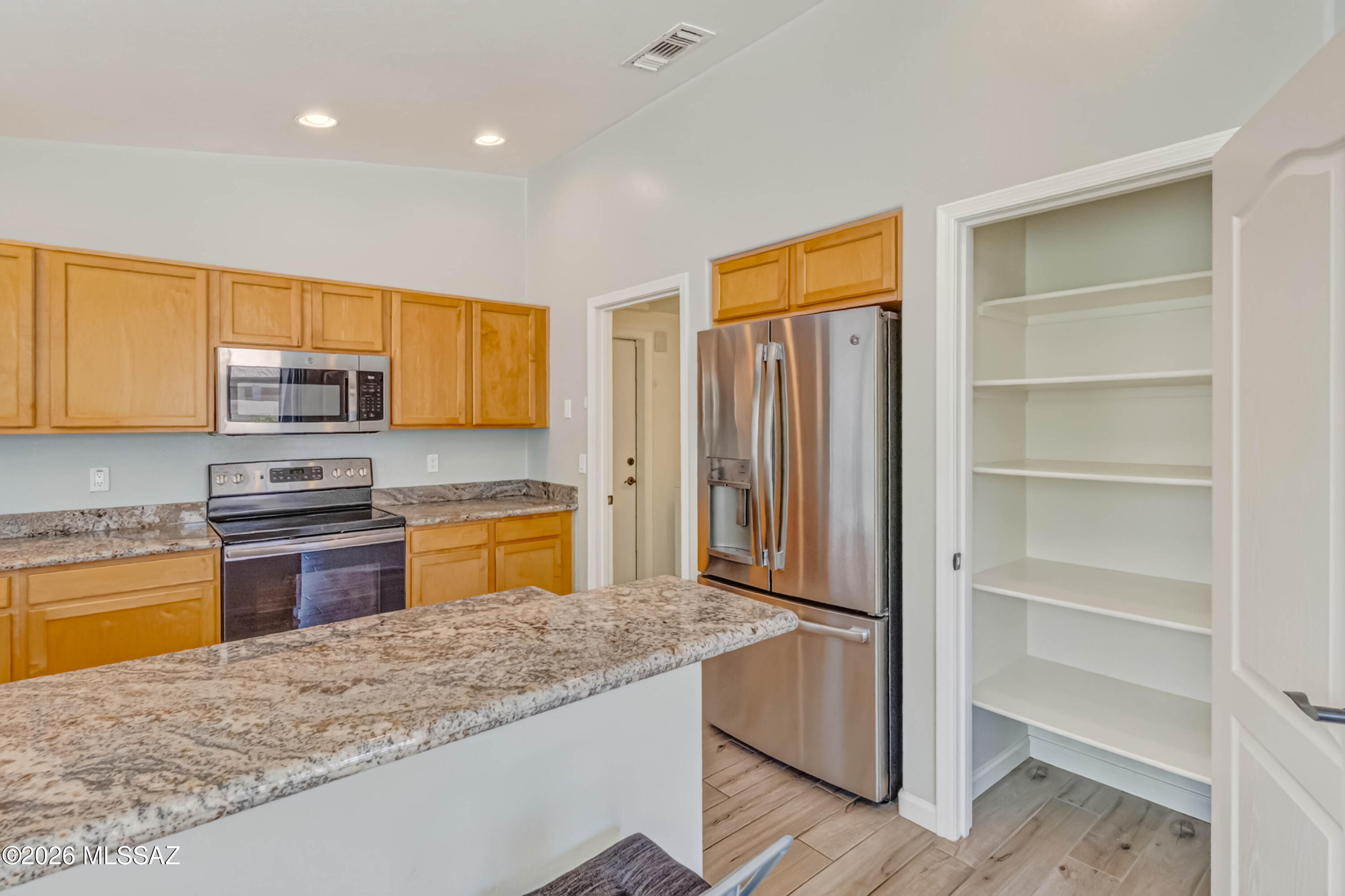 446 West Silvertip Road Tucson, AZ 85737 - Photo 23 of 51 Kitchen With SS Appliances