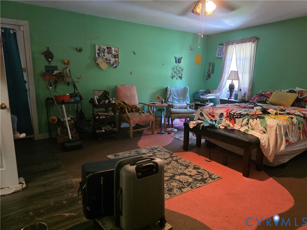 3161 Dorrell Road Aylett, VA 23009 - Photo 14 of 41 a bedroom with furniture and a window