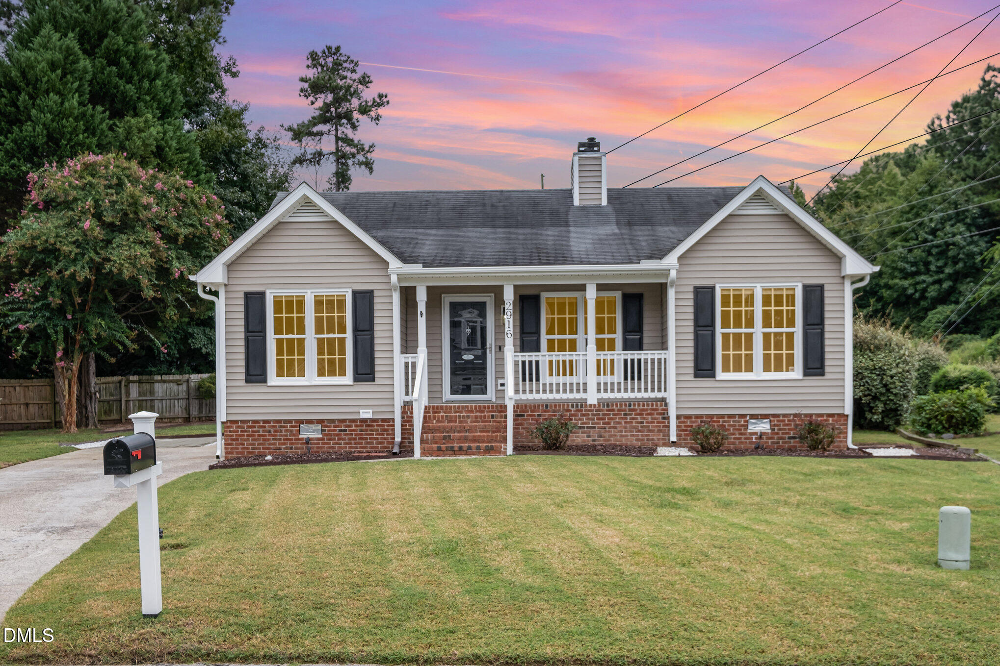 2916 Bannf Court Raleigh, NC 27604 - Photo 25 of 31 a front view of a house with a yard