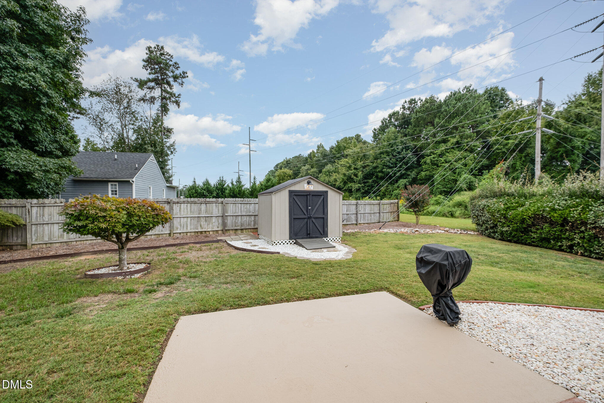 2916 Bannf Court Raleigh, NC 27604 - Photo 26 of 31 a swimming pool with lots of tress in front of it