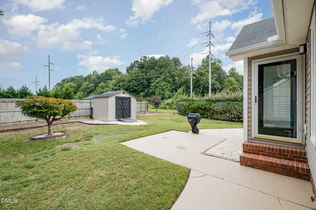 a house view with a garden space