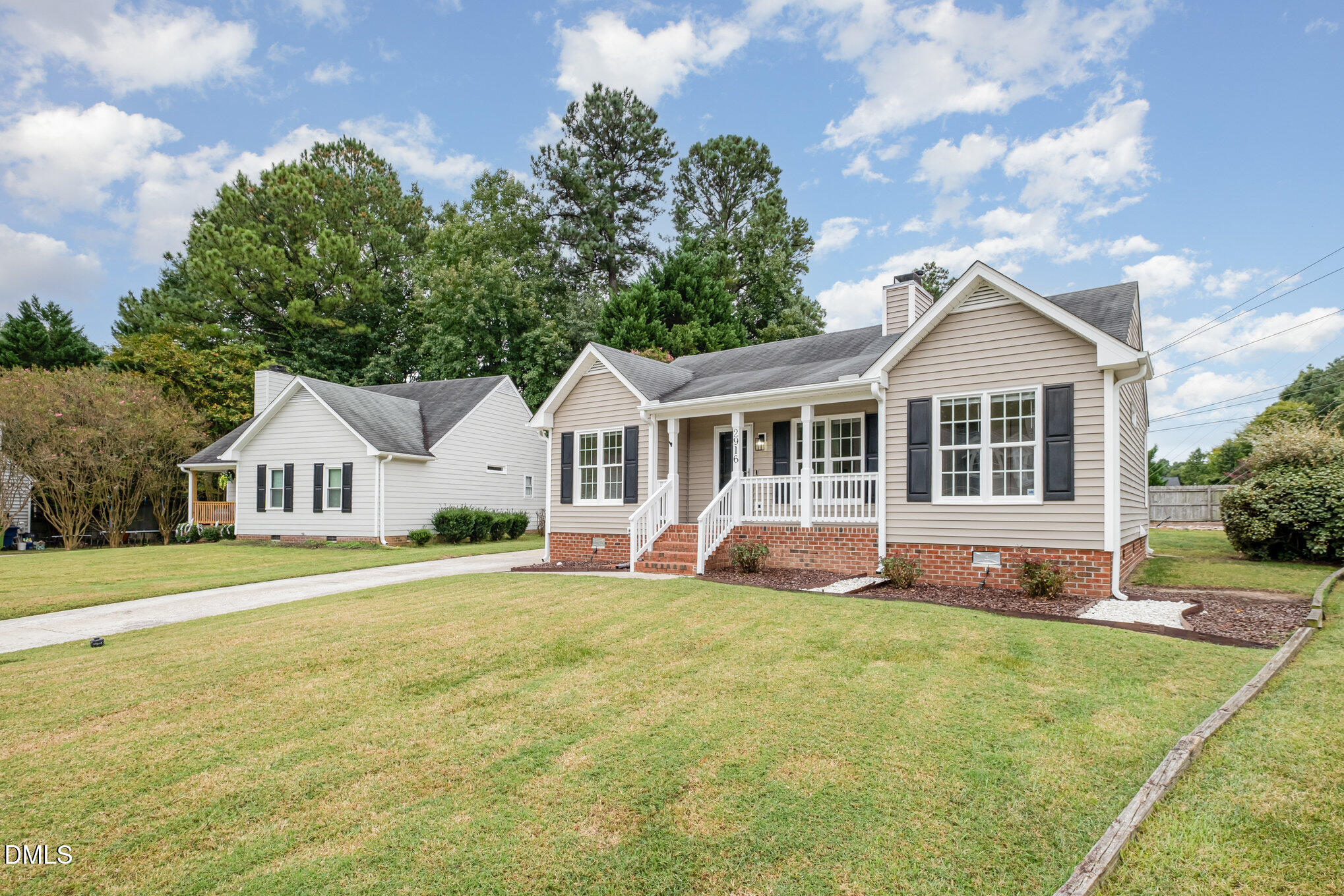 2916 Bannf Court Raleigh, NC 27604 - Photo 9 of 31 a view of house with outdoor space and swimming pool