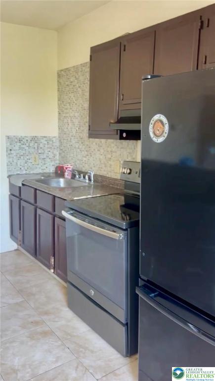 402 Ridge Avenue, Unit 4N Allentown, PA 18102 - Photo 2 of 9 a kitchen with a sink and a refrigerator