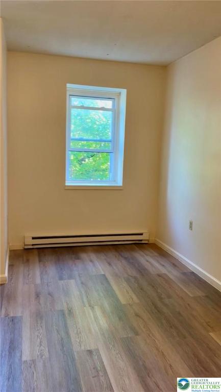402 Ridge Avenue, Unit 4N Allentown, PA 18102 - Photo 4 of 9 a view of a room with wooden floor and window