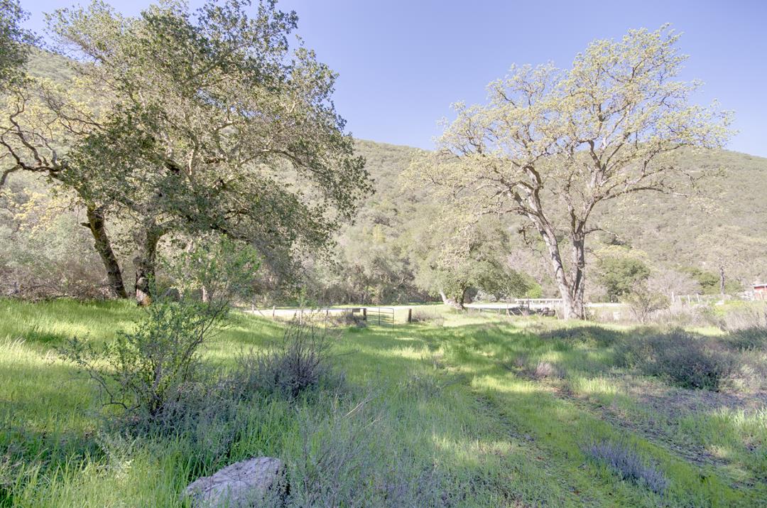 43515 East Carmel Valley Road Greenfield, CA 93927 - Photo 5 of 38 a backyard of a house with lots of green space