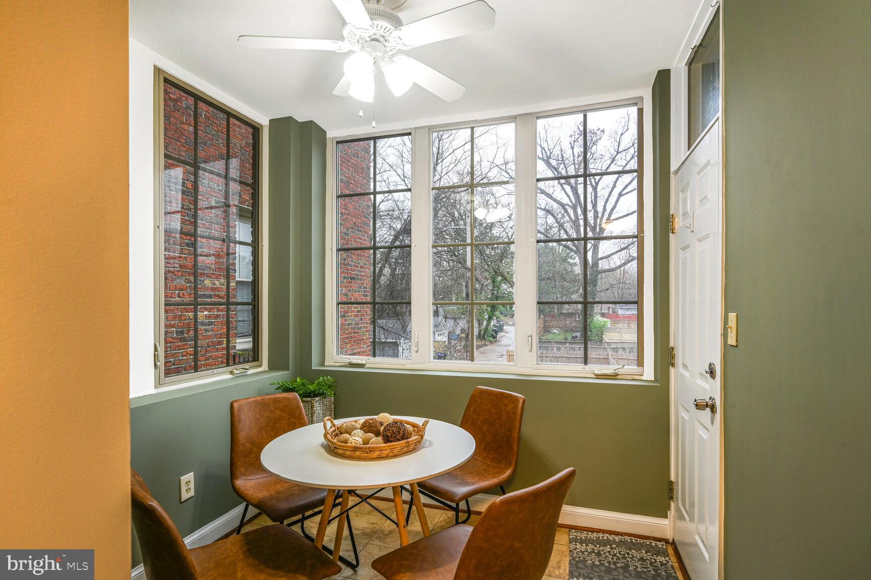 6722 3rd Street Northwest, Unit 203 Washington, DC 20012 - Photo 14 of 18 a dining room with furniture and window