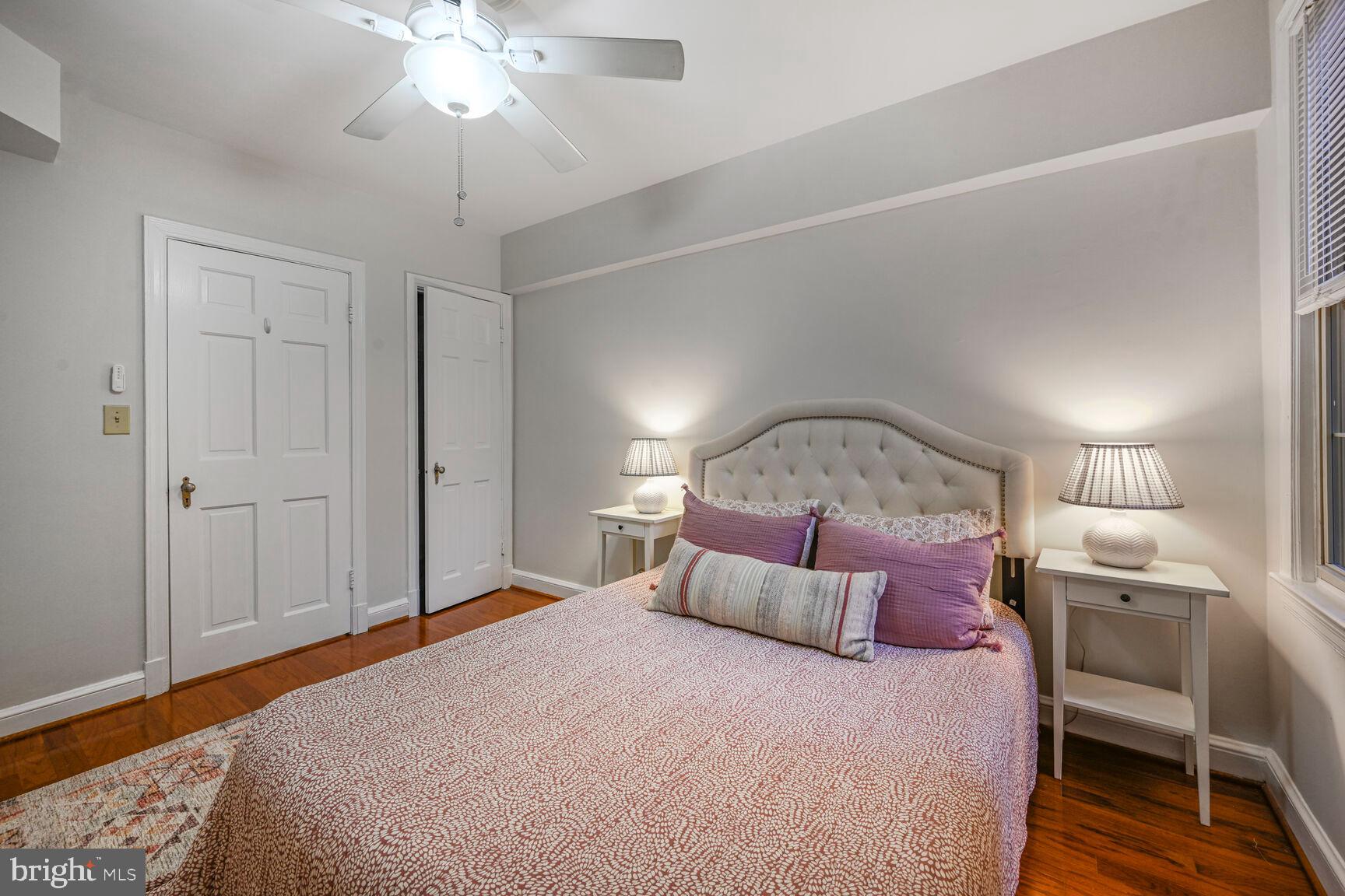 6722 3rd Street Northwest, Unit 203 Washington, DC 20012 - Photo 17 of 18 a bed room with a bed and a chair