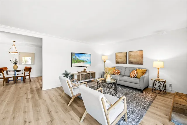 a living room with furniture and a table