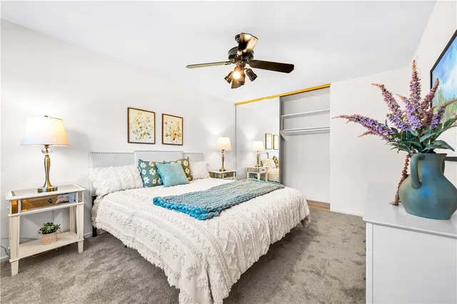 a bathroom with a sink a mirror and a shower