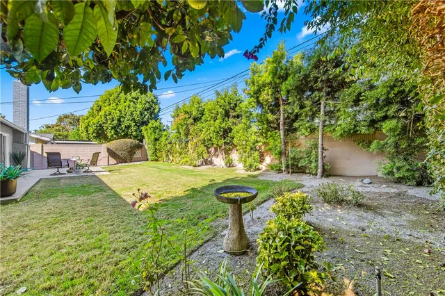 a view of an empty room with gym equipment