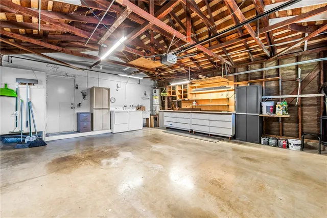 a view of a park with large trees