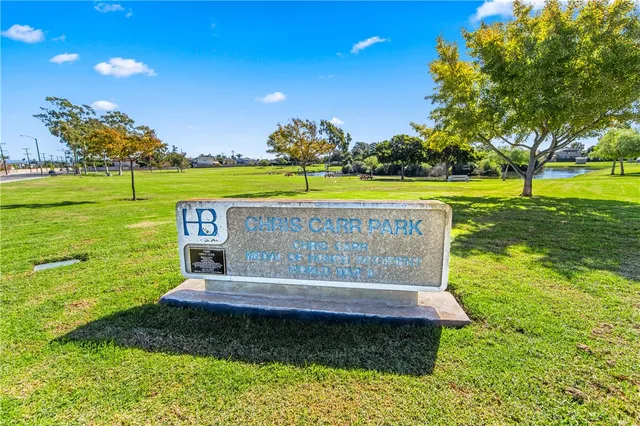 a view of a swimming pool with an outdoor space and seating area