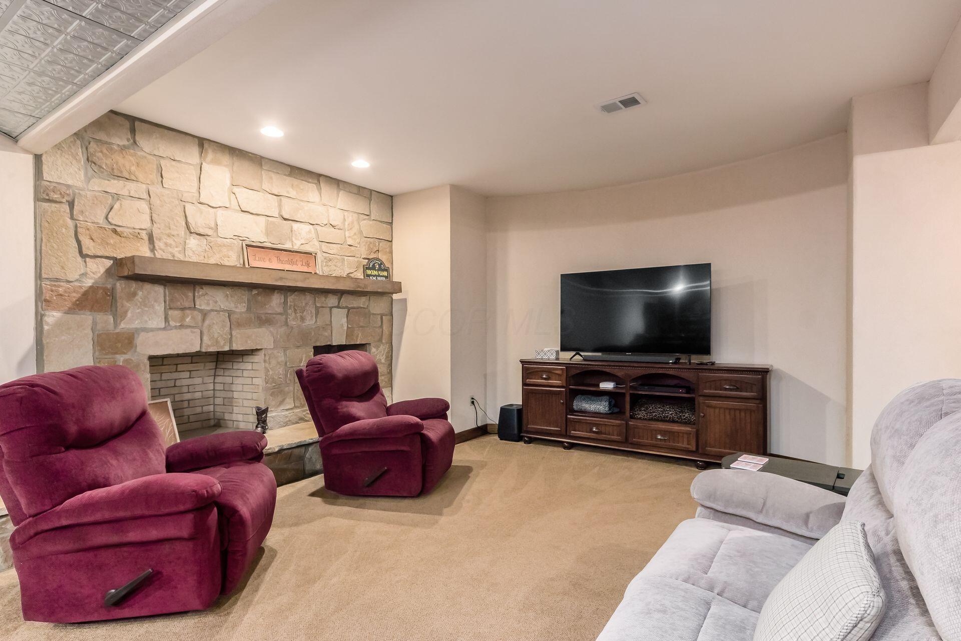 16187 Kreashbaum Road Rockbridge, OH 43149 - Photo 41 of 66 Gathering area in the lower level perfect for movie time.