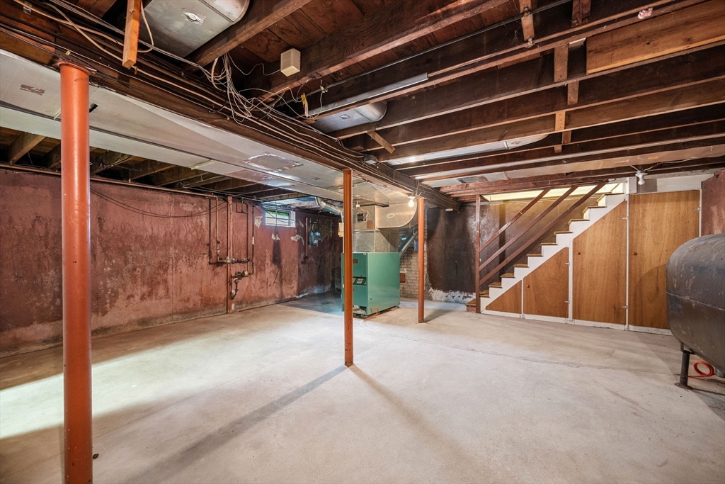 11 May Street Marblehead, MA 01945 - Photo 15 of 22 a view of an empty room with wooden floor