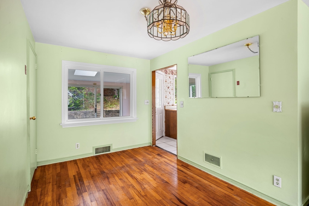 11 May Street Marblehead, MA 01945 - Photo 6 of 22 a view of an empty room with a window