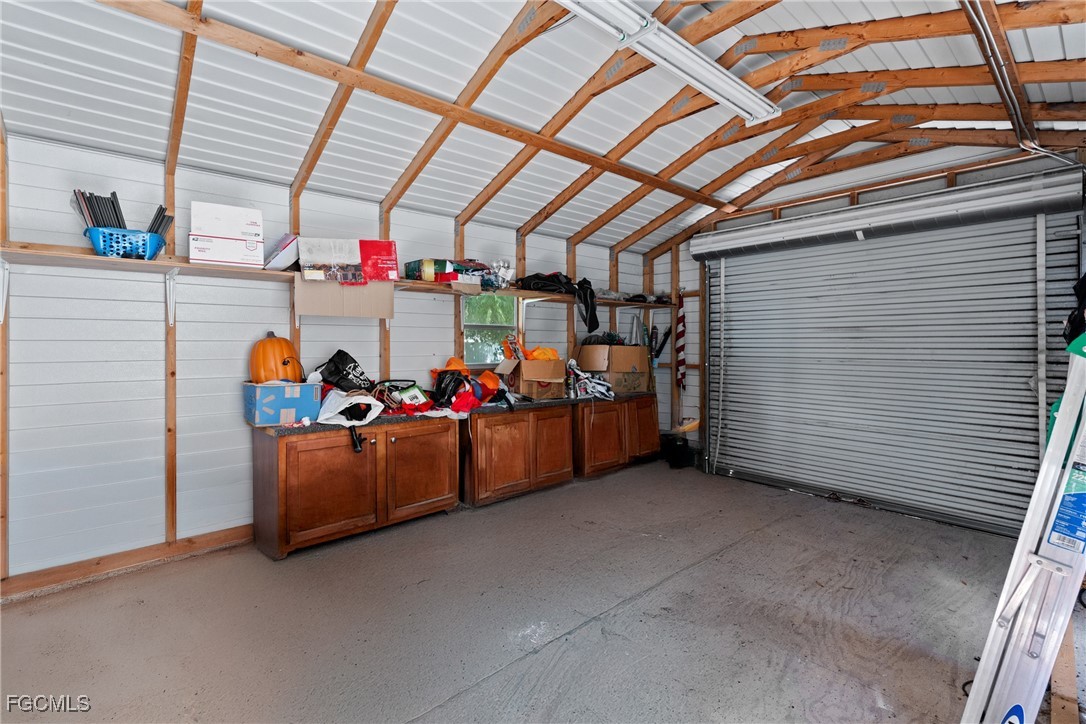 609 Gerald Avenue Lehigh Acres, FL 33936 - Photo 30 of 45 a view of storage and utility room