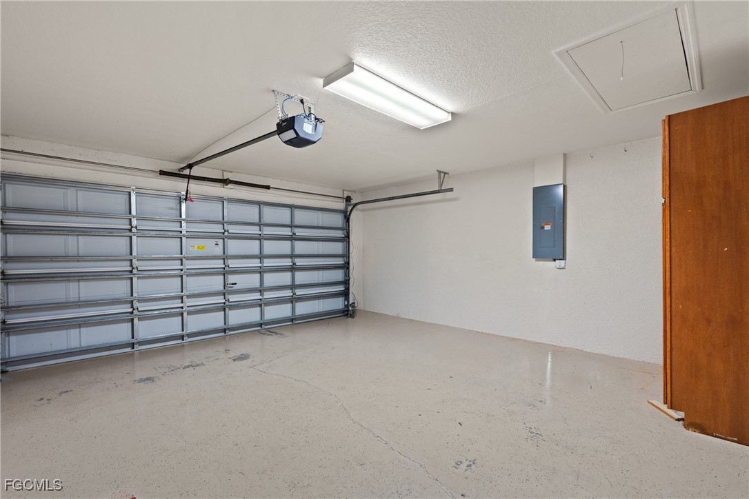 609 Gerald Avenue Lehigh Acres, FL 33936 - Photo 35 of 45 a view of a garage
