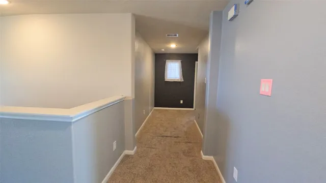 a bathroom with a bathtub and a toilet