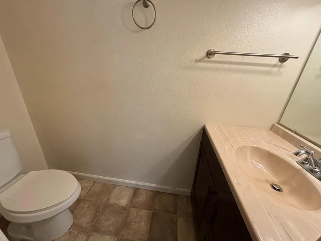 a bathroom with a sink and a toilet