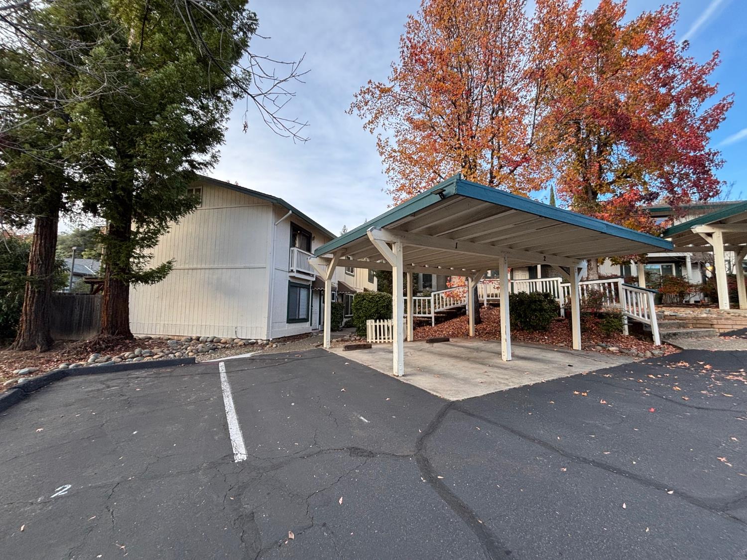 3579 Cedar Ravine Road Placerville, CA 95667 - Photo 2 of 15 a patio with a table and chairs under an umbrella