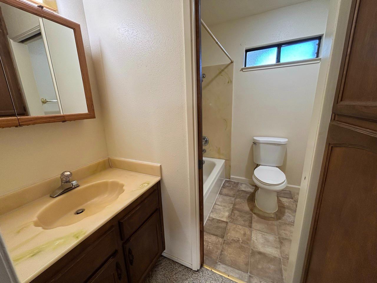 3579 Cedar Ravine Road Placerville, CA 95667 - Photo 10 of 15 a bathroom with a sink a toilet and mirror
