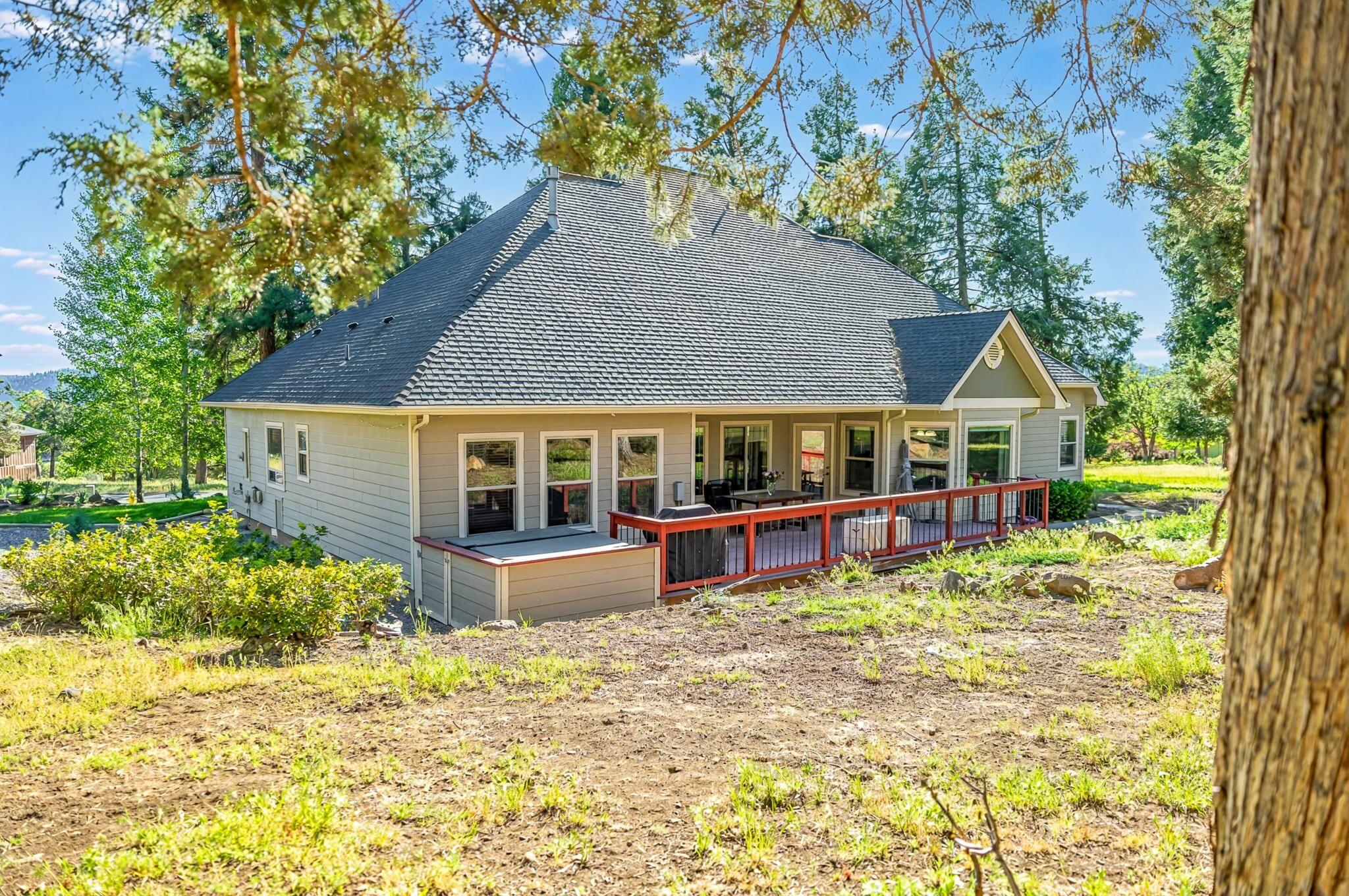 10421 Kestrel Road Klamath Falls, OR 97601 - Photo 4 of 56 a front view of a house with swimming pool