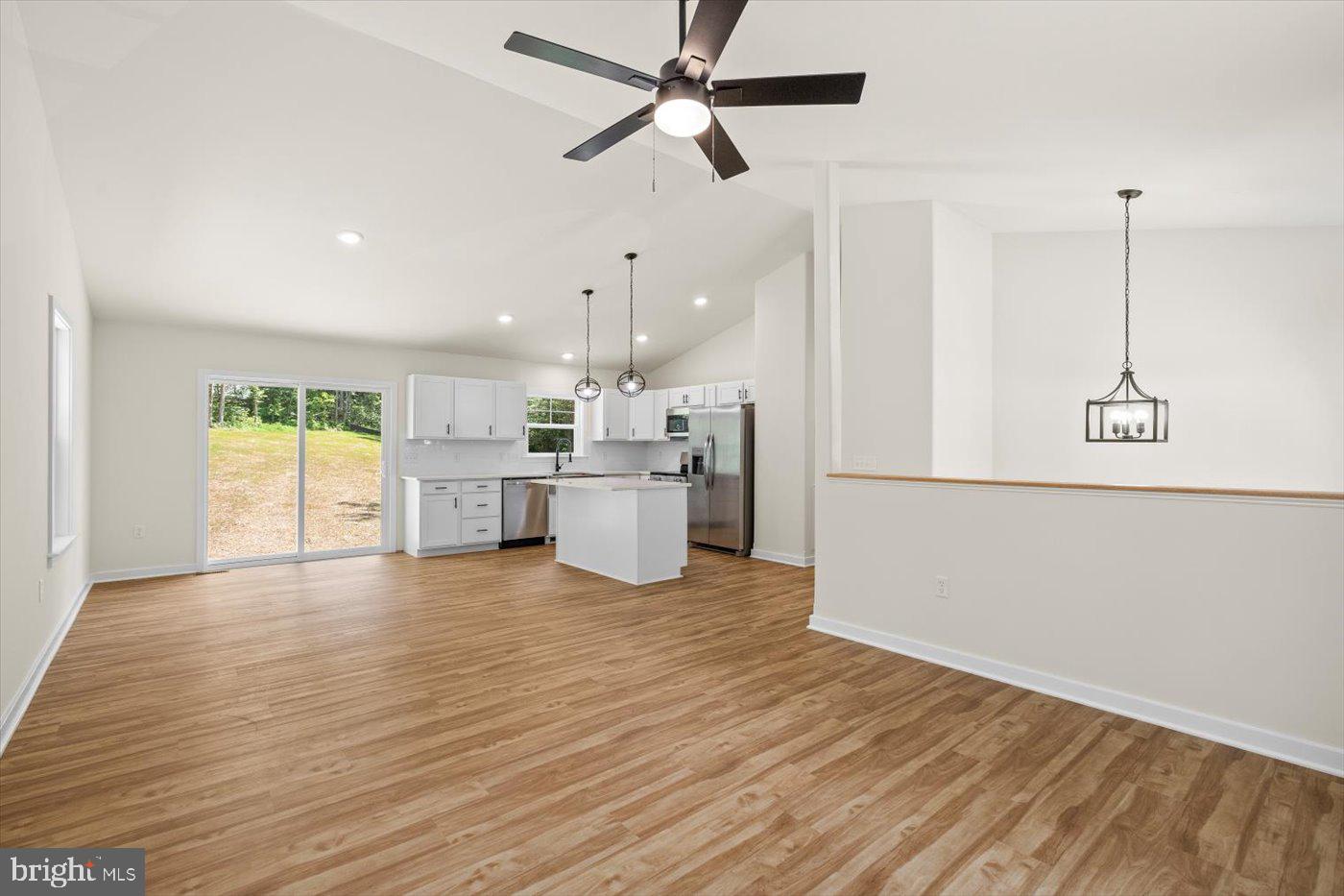 3319 Partlow Road Partlow, VA 22534 - Photo 14 of 47 a view of a kitchen with a dishwasher cabinets and wooden floor