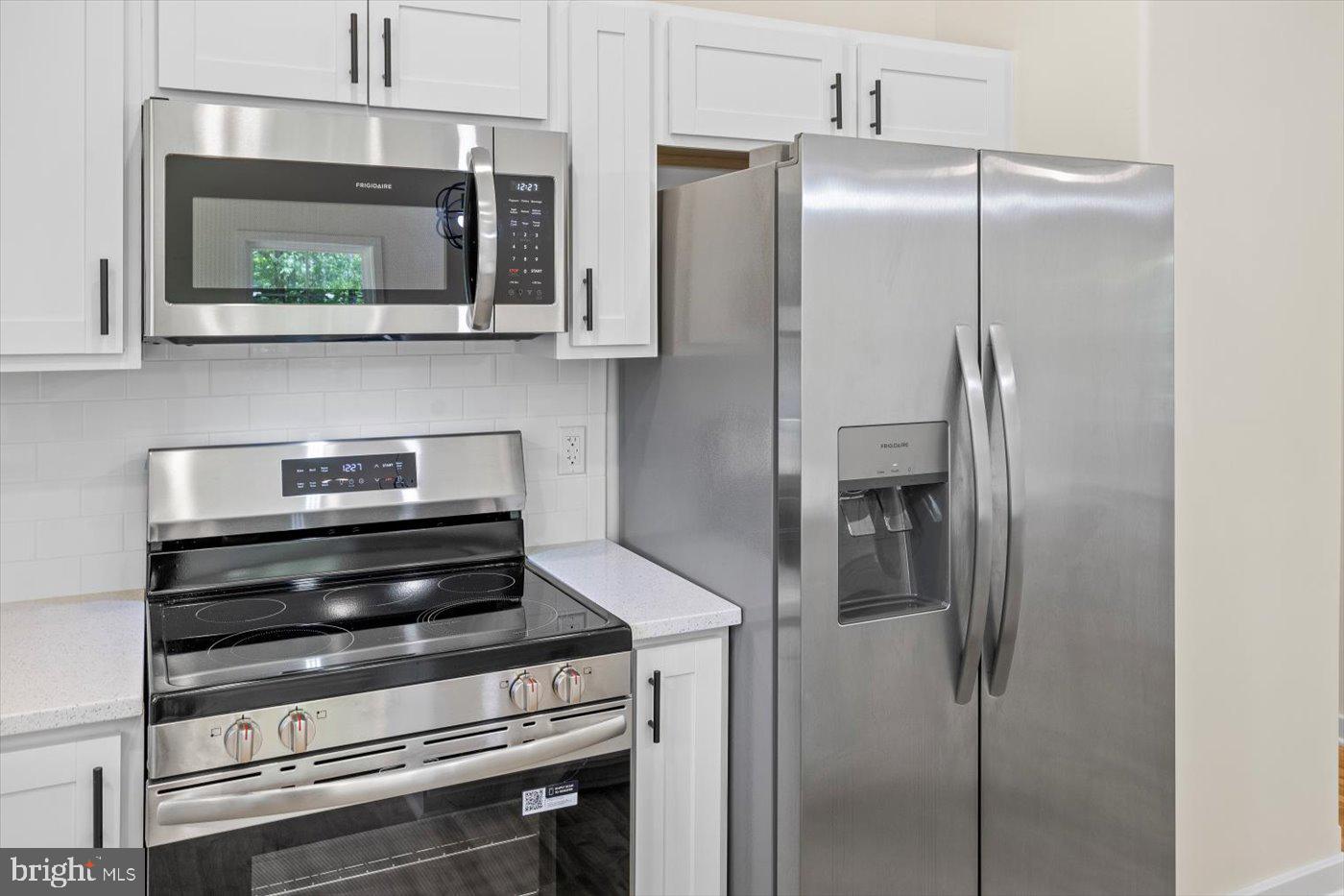 3319 Partlow Road Partlow, VA 22534 - Photo 24 of 47 a kitchen with stainless steel appliances a refrigerator and cabinets