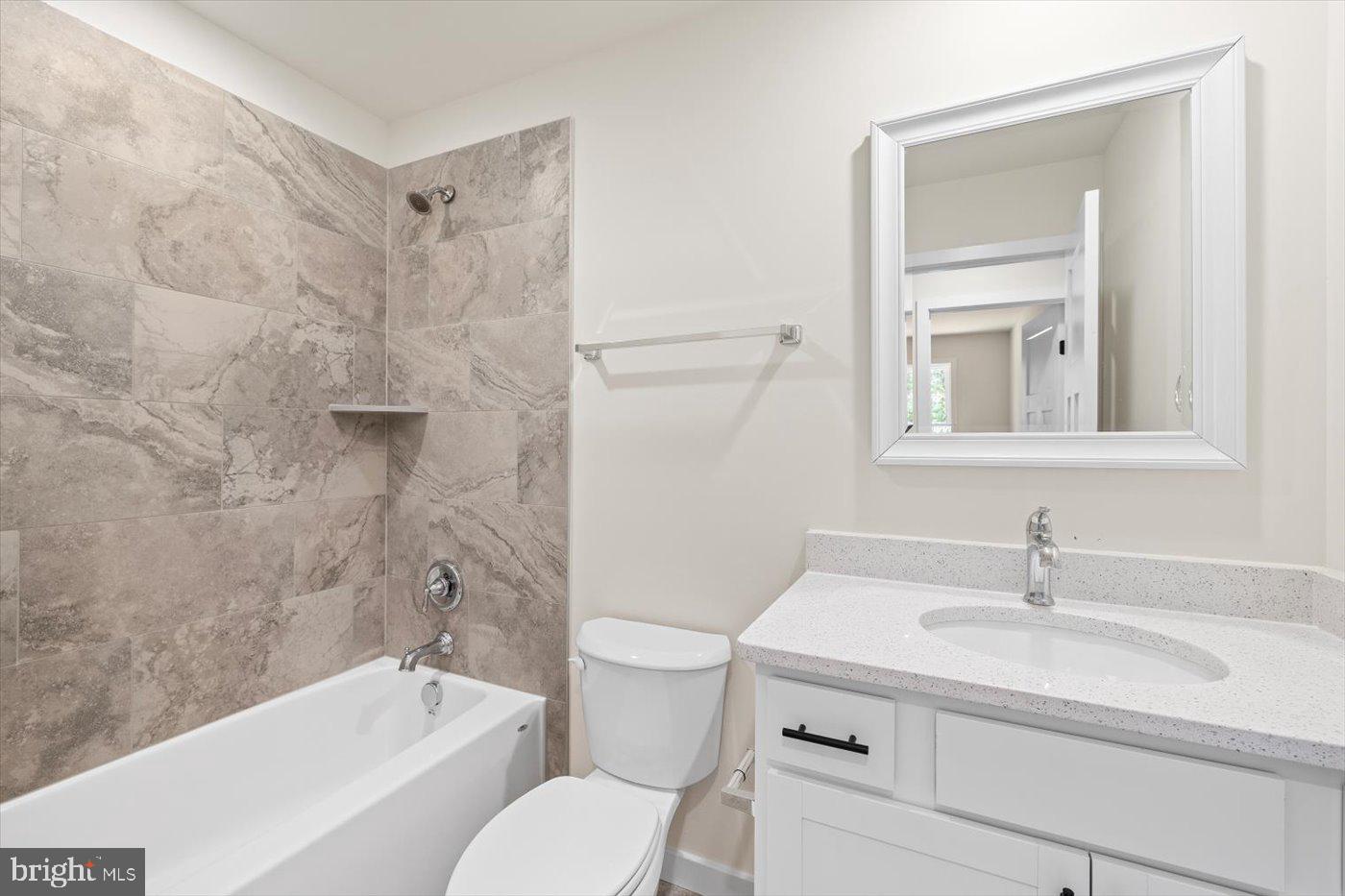 3319 Partlow Road Partlow, VA 22534 - Photo 26 of 47 a bathroom with a sink toilet and shower