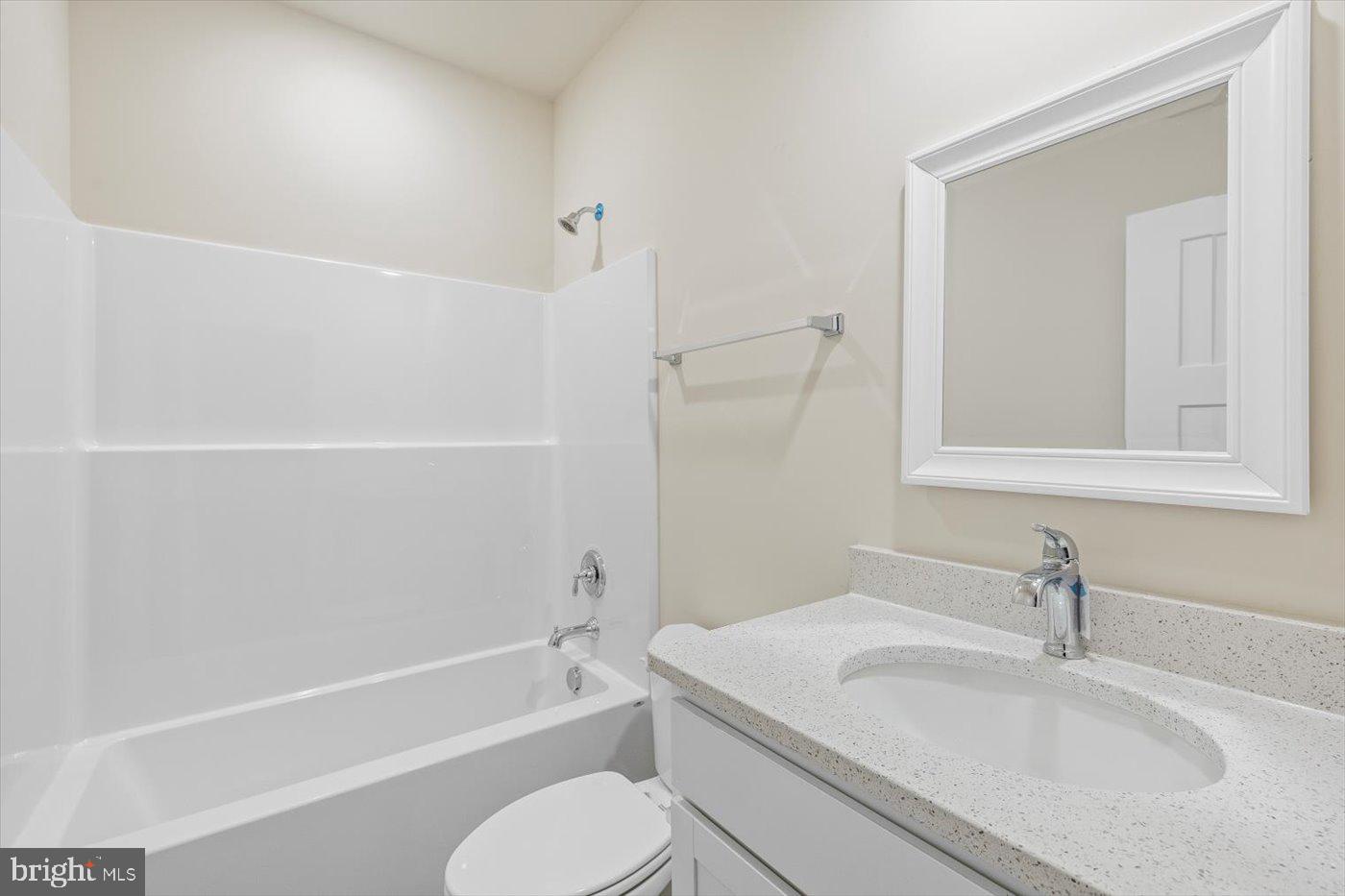 3319 Partlow Road Partlow, VA 22534 - Photo 39 of 47 a bathroom with a sink toilet and bathtub