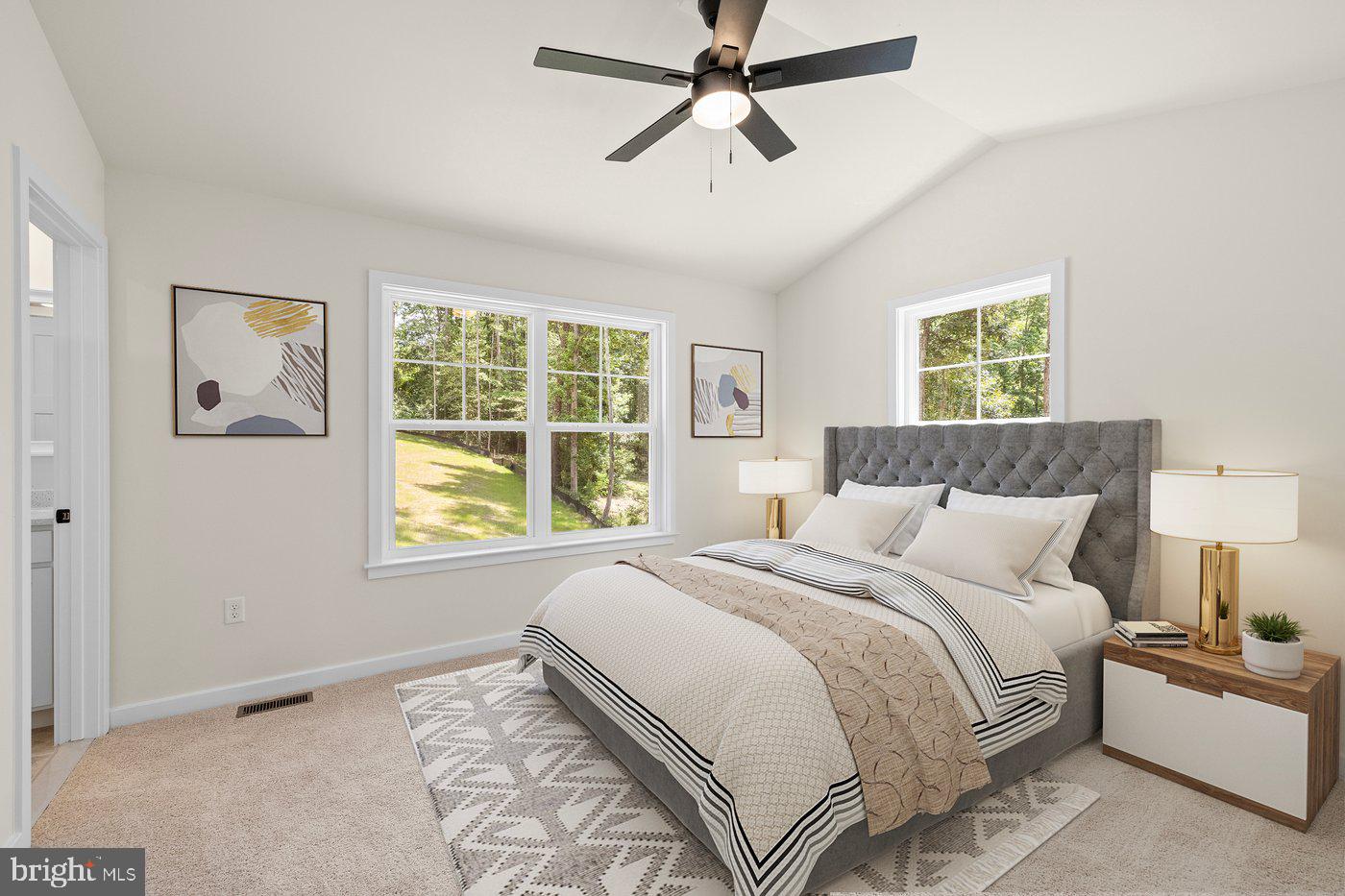 3319 Partlow Road Partlow, VA 22534 - Photo 7 of 47 a bedroom with a large bed and a window