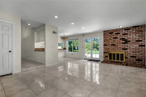 a view of livingroom with furniture and an entryway