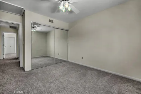 an empty room with a bathroom