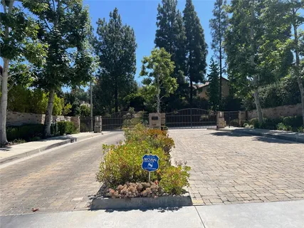 a view of entrance gate of a house