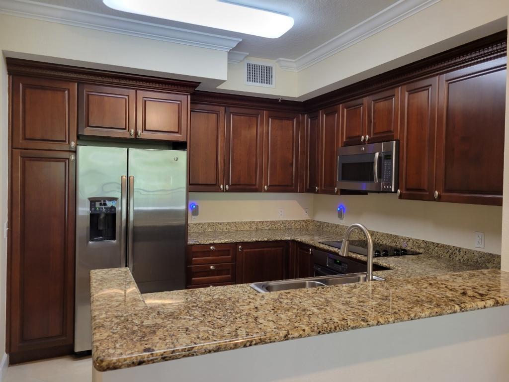 1690 Renaissance Commons Boulevard, Unit 1309 Boynton Beach, FL 33426 - Photo 2 of 19 D817E5DC-C3F5-4D8C-B136-2D9722FC1B6F