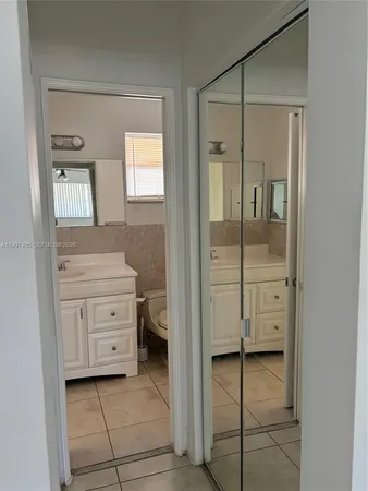a bathroom with a tub and a sink