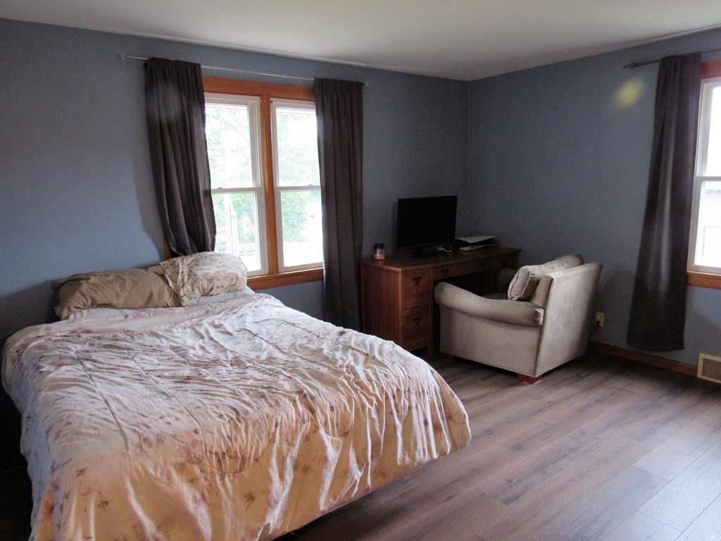2340 Main Street Three Rivers, MA 01080 - Photo 17 of 31 a bedroom with bed and a flat screen tv