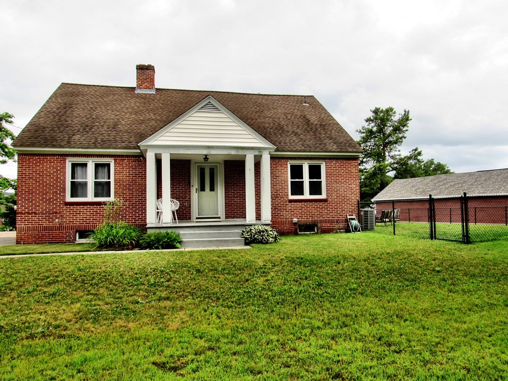 2340 Main Street Three Rivers, MA 01080 - Photo 2 of 31 a front view of a house with a yard