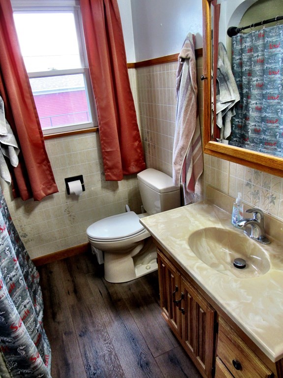 2340 Main Street Three Rivers, MA 01080 - Photo 21 of 31 a bathroom with a granite countertop toilet sink and mirror